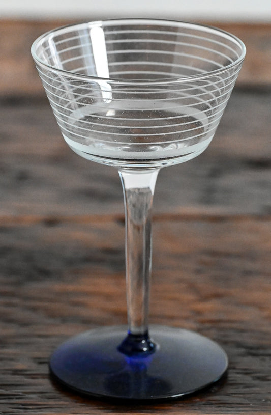 lined clear coupe with blue foot