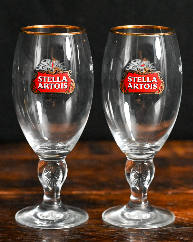 clear Stella Artois goblets with gold rim