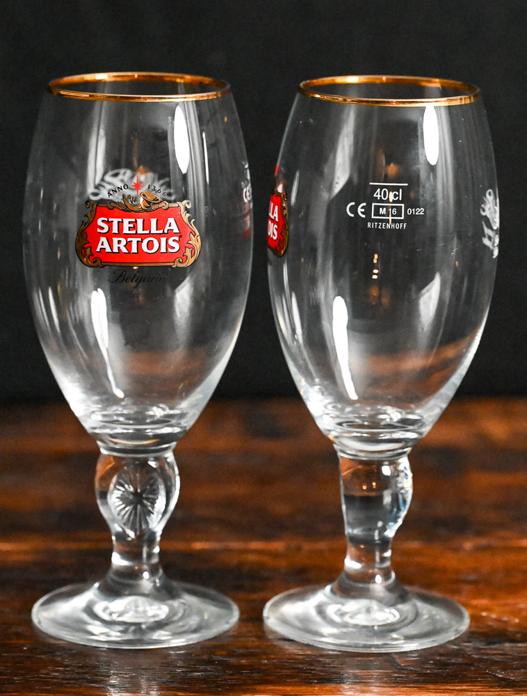 clear Stella Artois goblets with gold rim