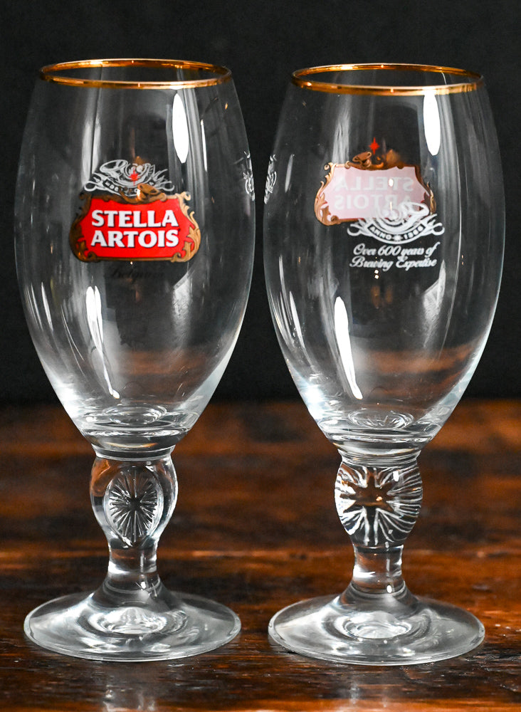clear Stella Artois goblets with gold rim