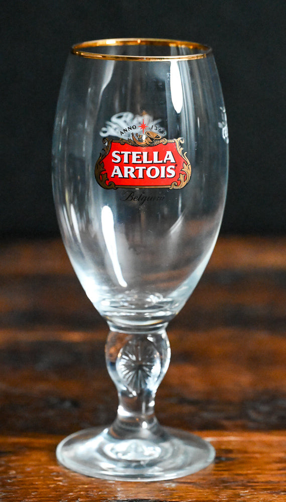 clear Stella Artois goblets with gold rim