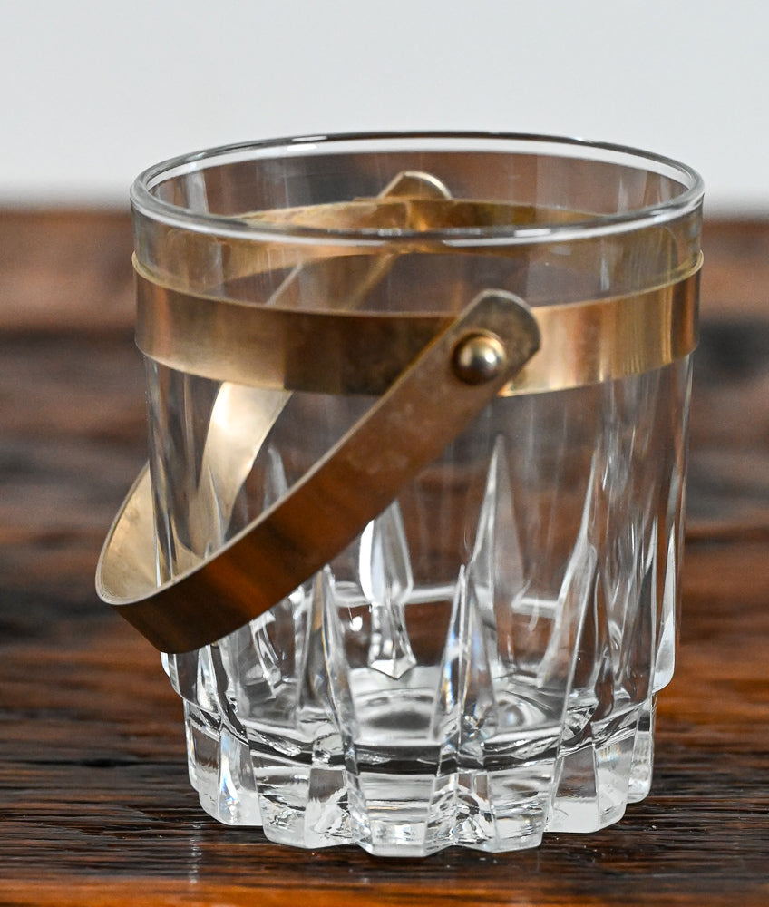 single cut bottom rocks glass with gold handle