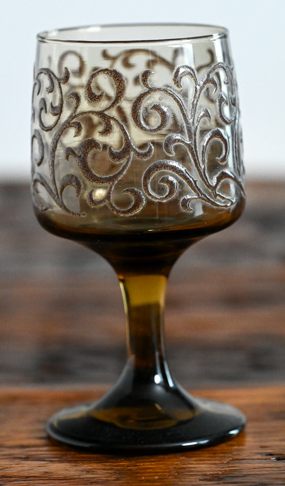 brown scrolls on brown glass Libbey goblet