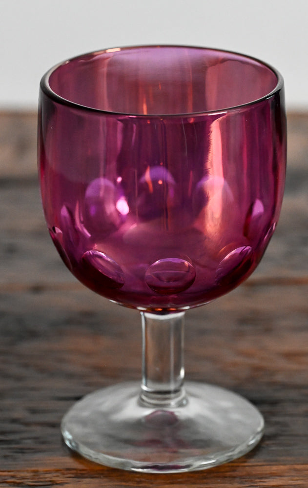 Bartlett Collins pink glass goblet, clear stem and foot