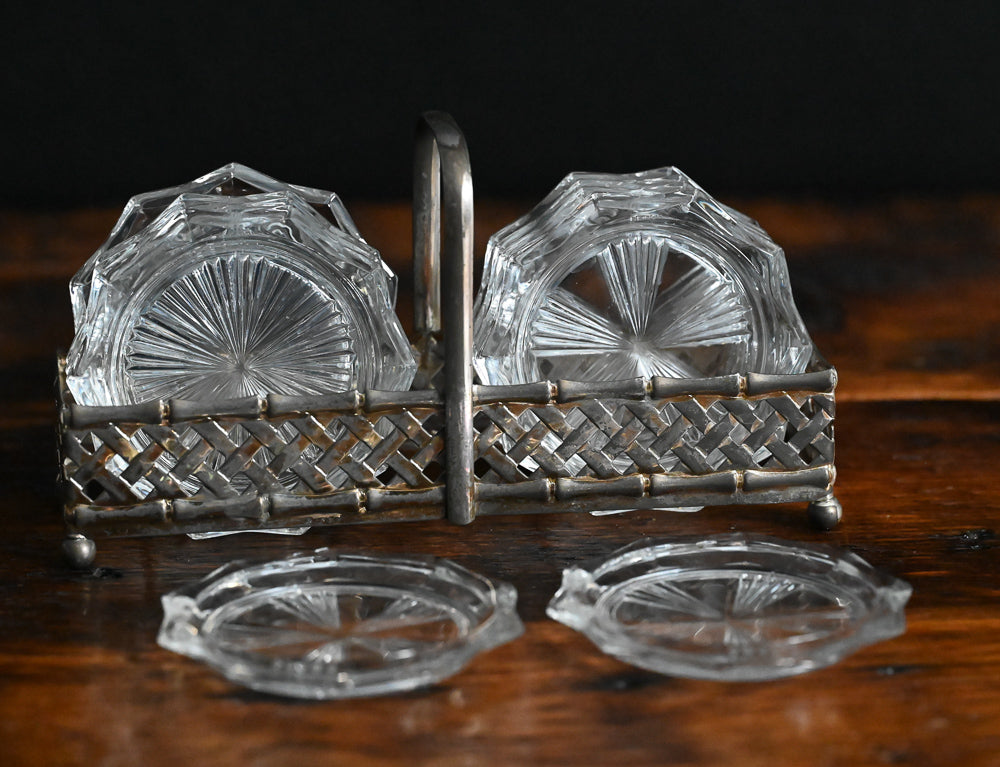 clear glass coasters in metal carrier