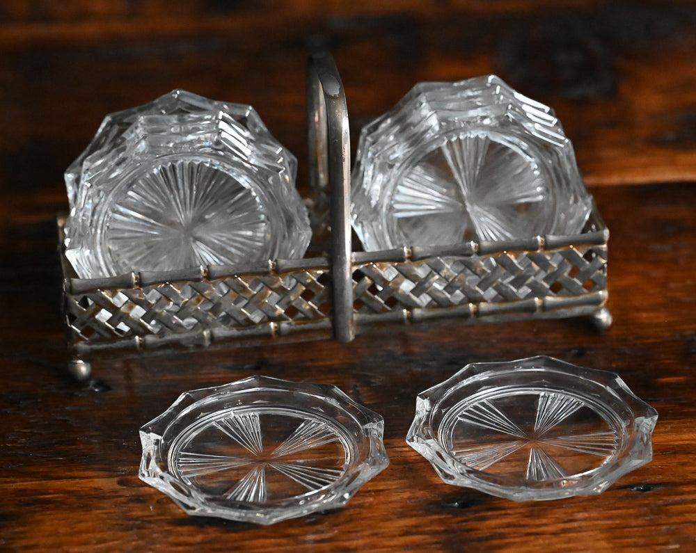 clear glass coasters in metal carrier