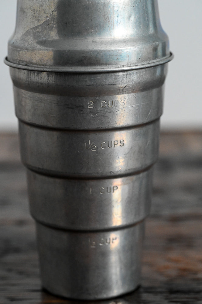 aluminum measuring cup with lid