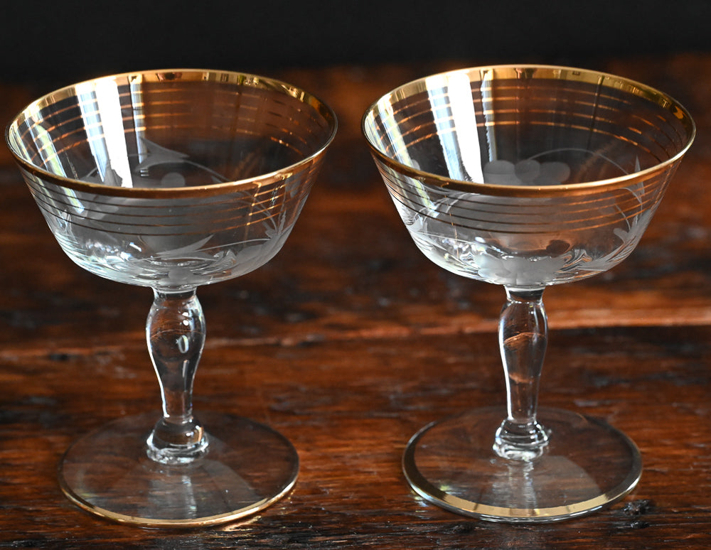 gold rim and gold striped flower etched cocktail coupes