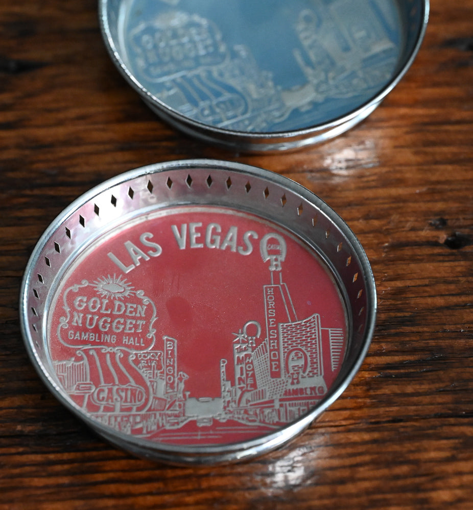 red and blue Las vegas metal souvenir coasters
