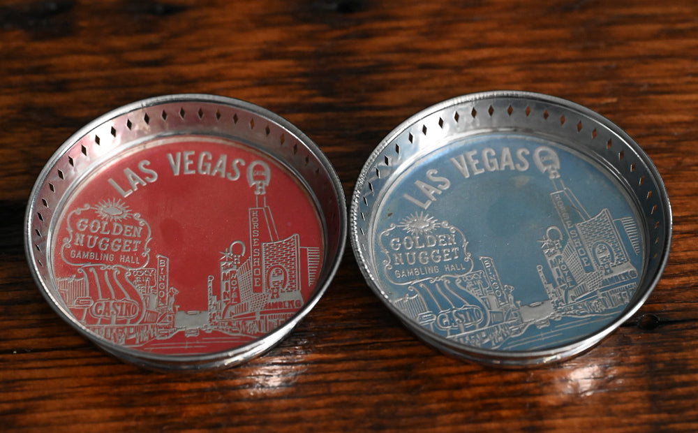 red and blue Las vegas metal souvenir coasters