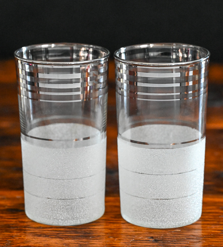 silver banded and frosted tumbler glass