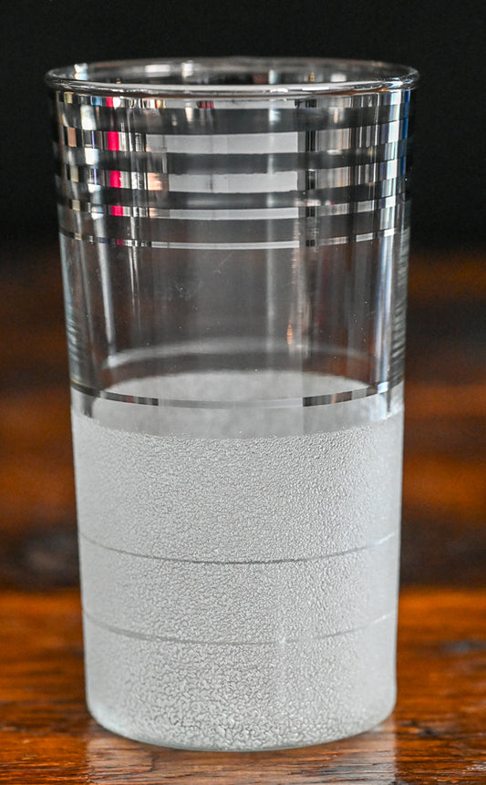 silver banded and frosted tumbler glass