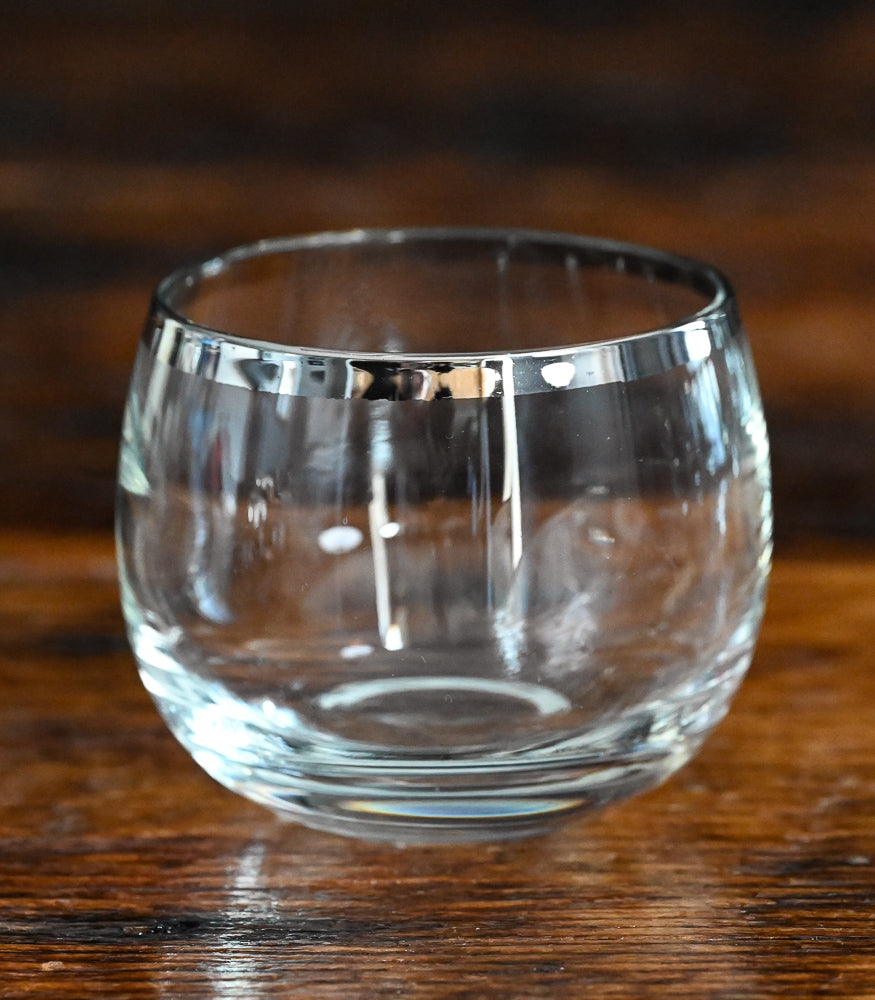 silver banded cocktail pitcher, glass cocktail stirrer and 6 silver rim roly poly glasses