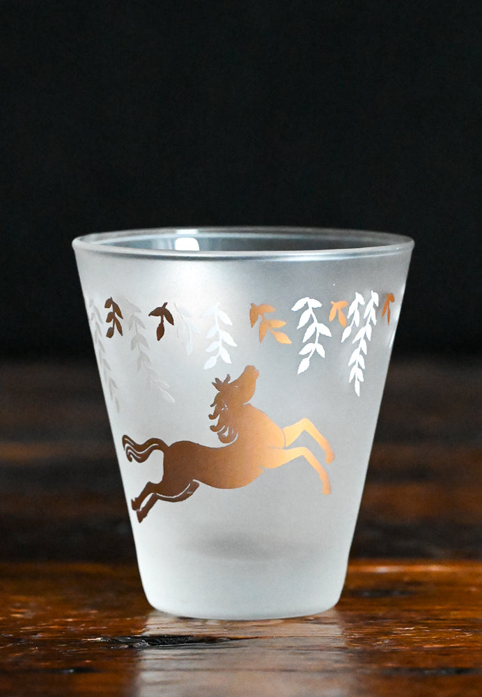 White and gold horses and leaves on frosted lowball glasses