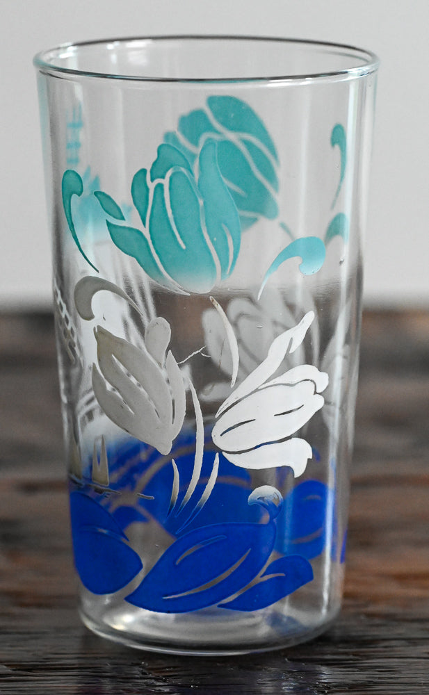 light blue, white and blue floral and windmill pattern glass