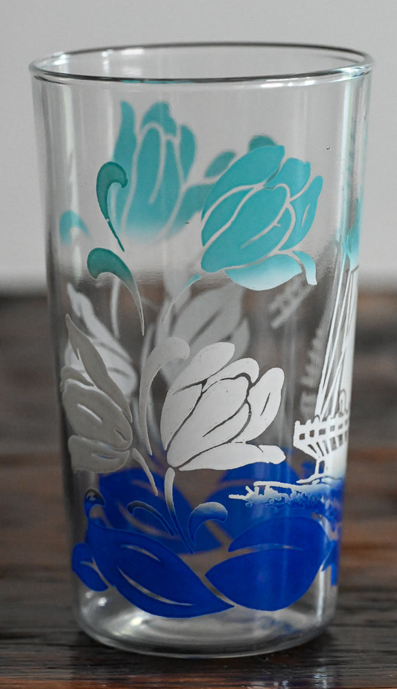 light blue, white and blue floral and windmill pattern glass
