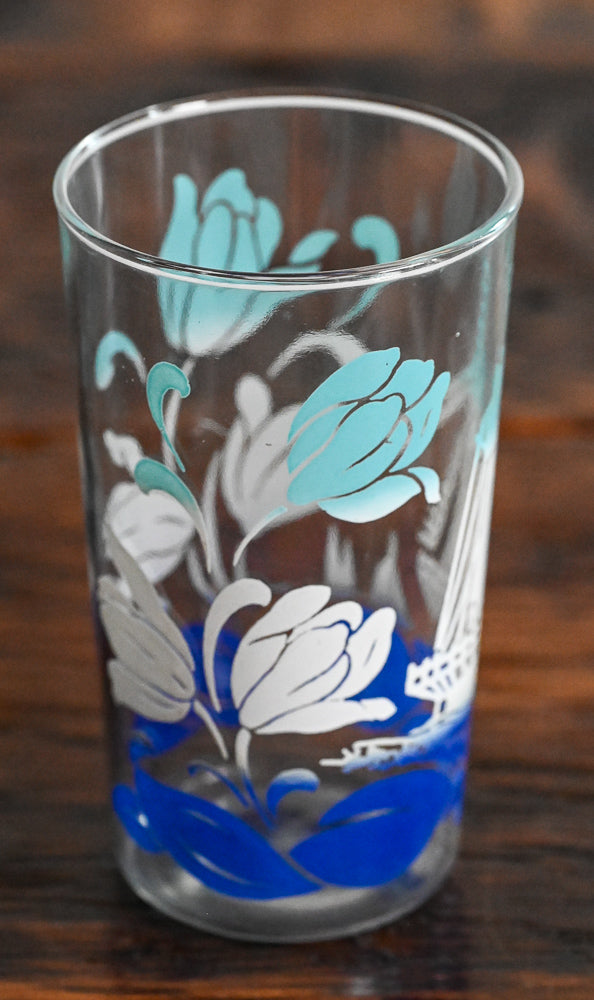 light blue, white and blue floral and windmill pattern glass
