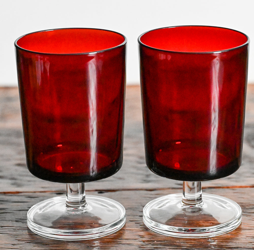 ruby red Luminarc Cavalier water goblets with clear stems