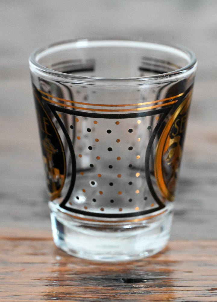 black and gold print Seattle Souvenir shot glass