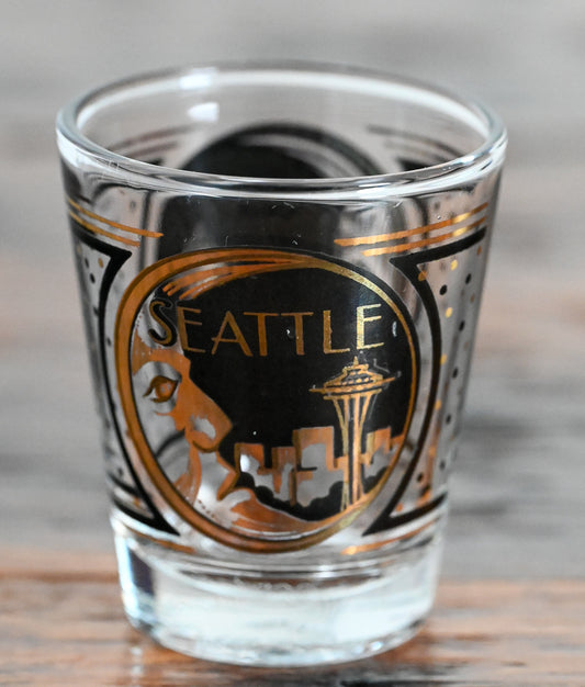 black and gold print Seattle Souvenir shot glass