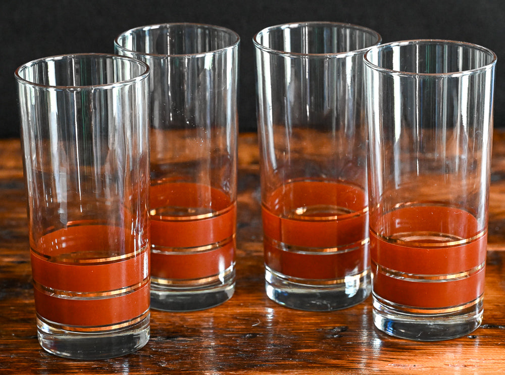 brown and gold striped bottom highball glass