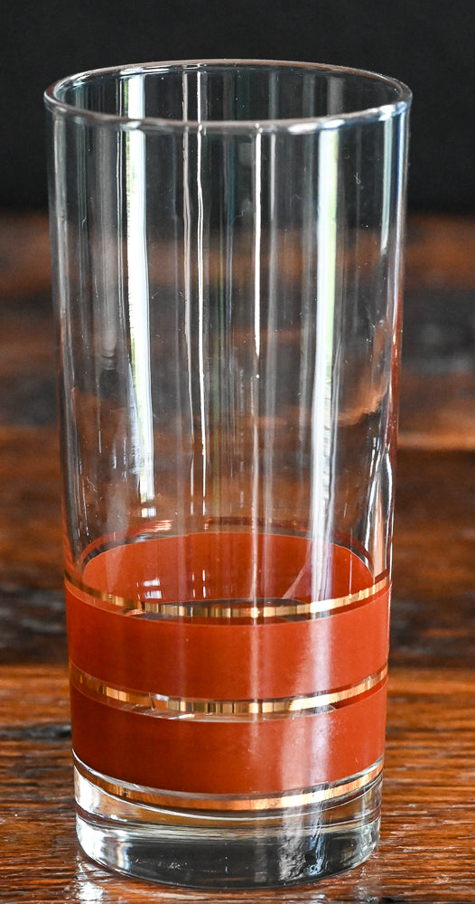 brown and gold striped bottom highball glass