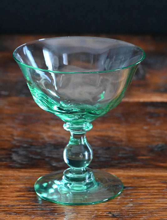 green glass cocktail coupe
