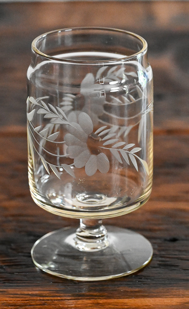 Floral etched footed tumbler