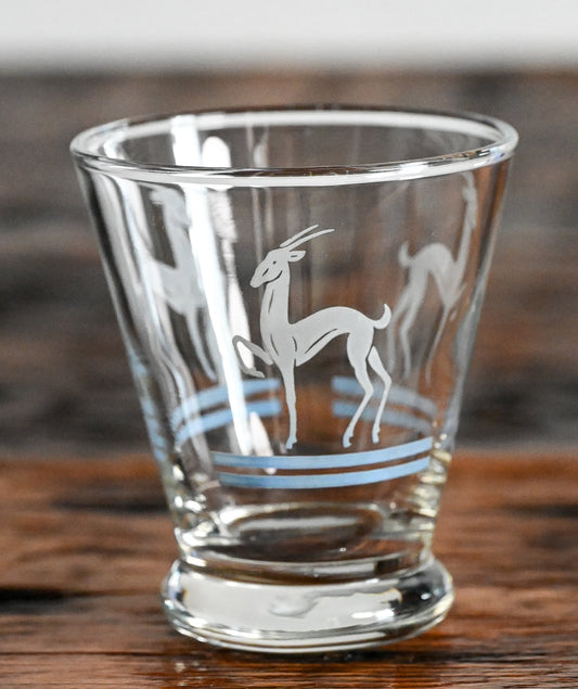 small glass Anchor Hocking tumbler with white gazelle and blue stripes