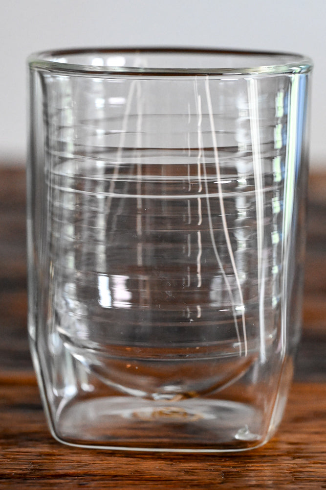 clear rocks glass with marked lines