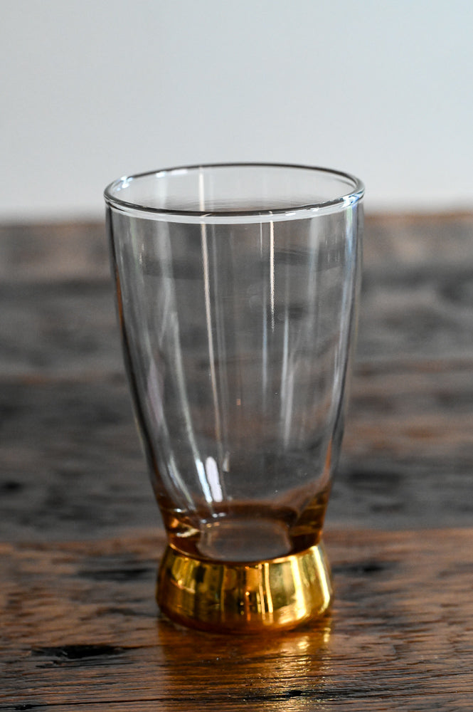 clear glass tumbler with gold bottom