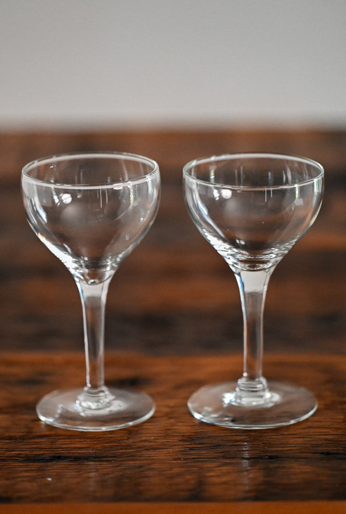 glass coupes on wood table