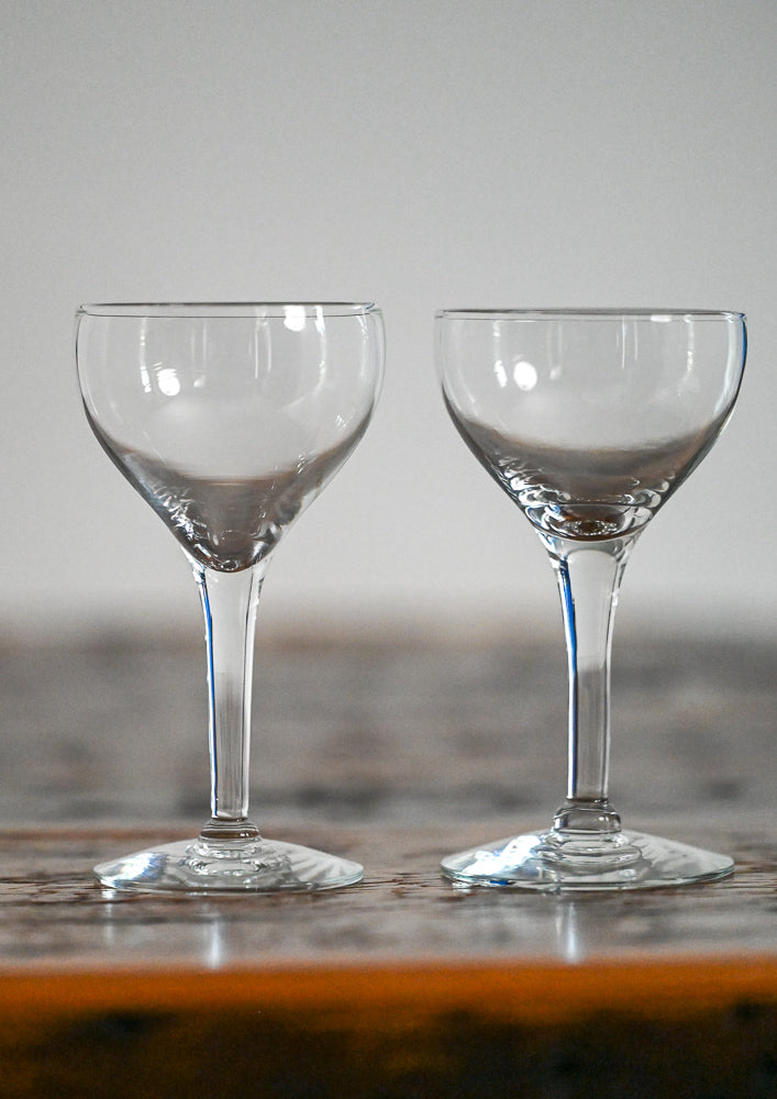 glass coupes on wood table