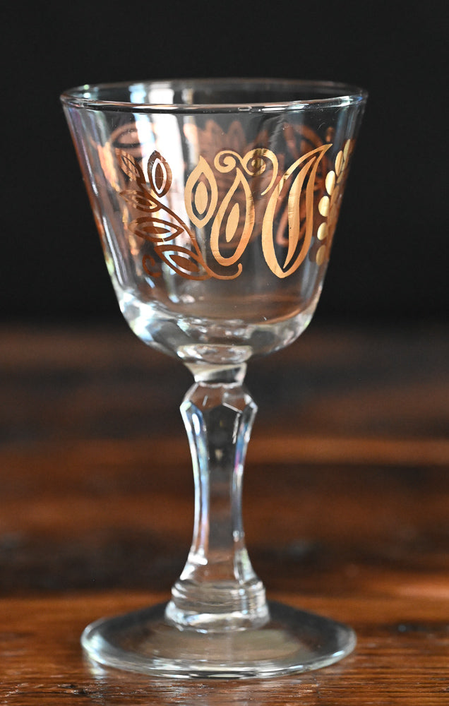 gold butterfly and foliage print coupe glass
