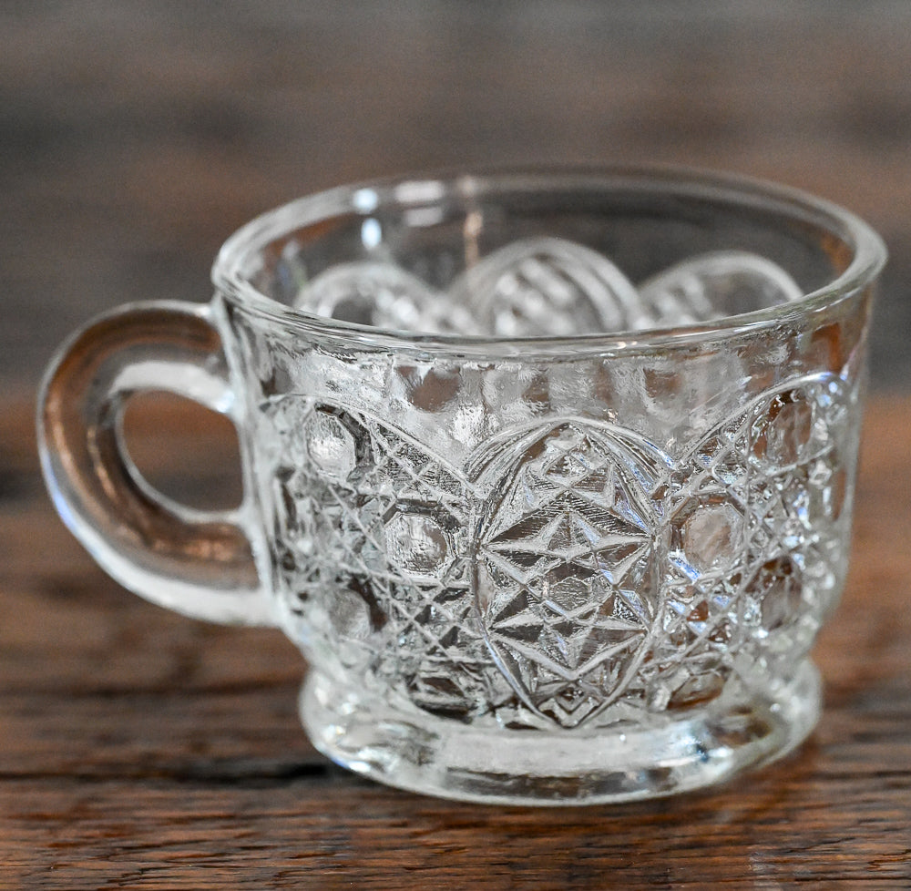 cut glass tea cup with handle