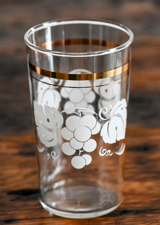 tumbler with white grapes and leaves, gold band