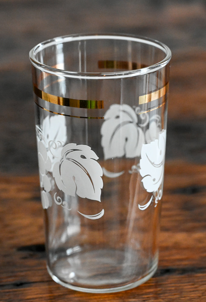 tumbler with white grapes and leaves, gold band