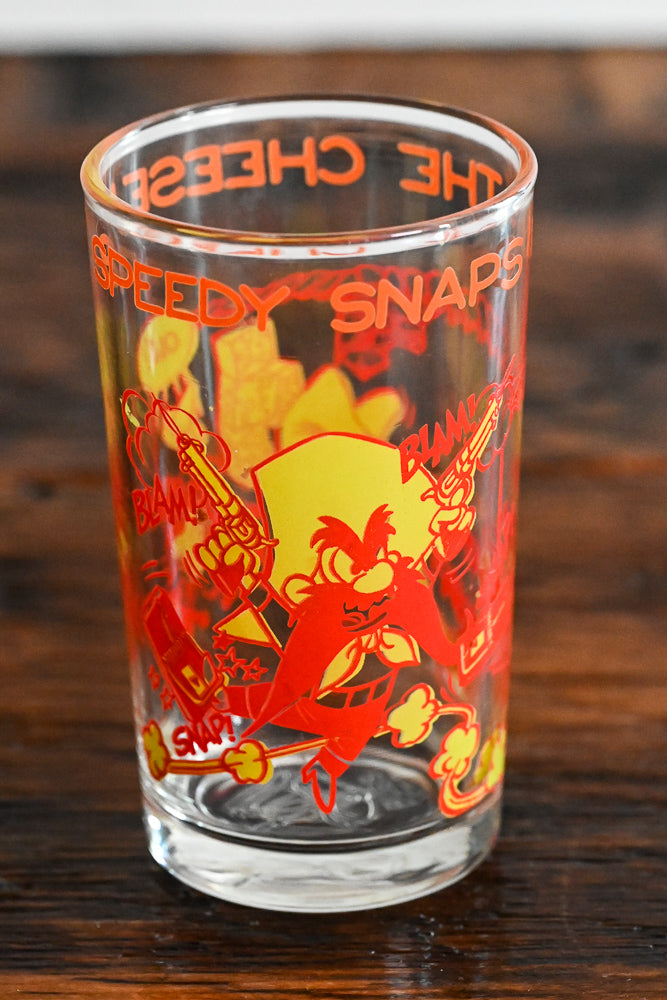 red and yellow Looney Toons Glass