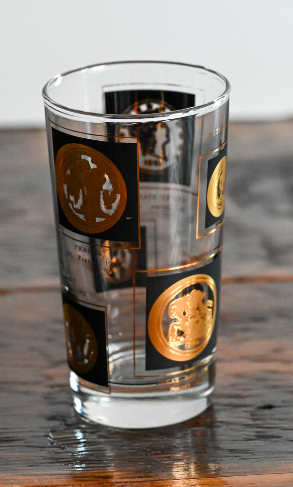 gold coin and black accented highball glass