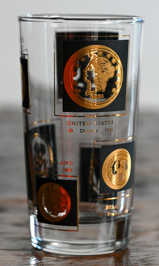 gold coin and black accented highball glass