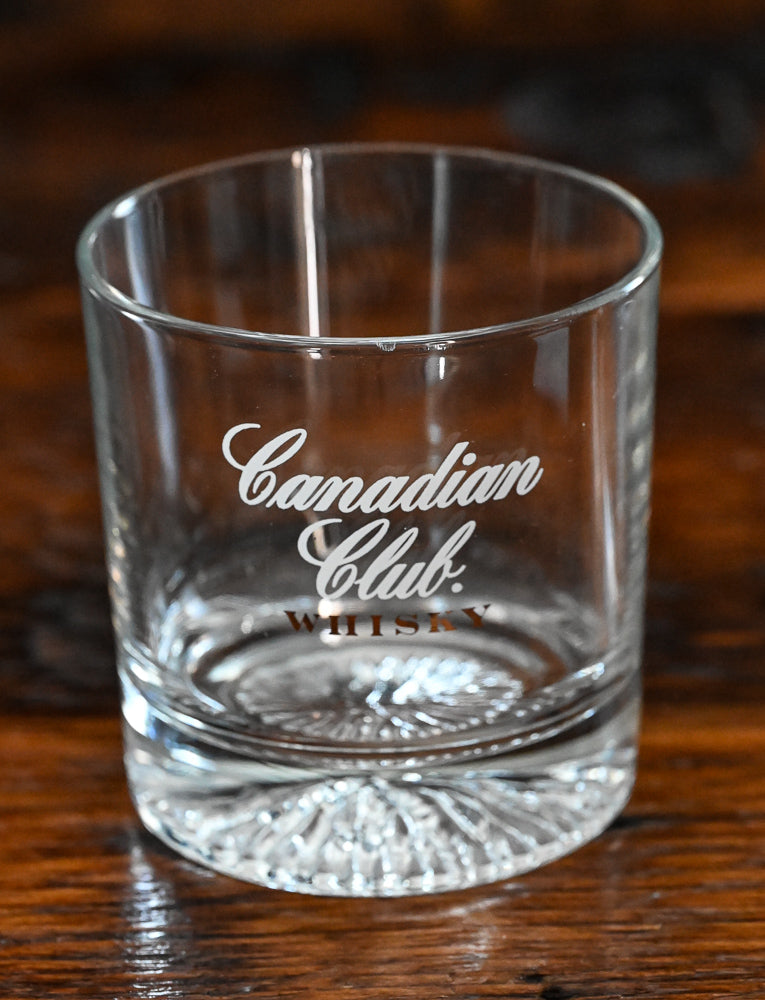 clear Canadian Club whisky rocks glass with glacier bottom