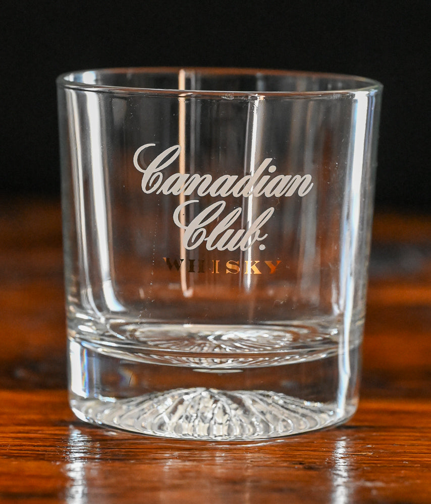 clear Canadian Club whisky rocks glass with glacier bottom
