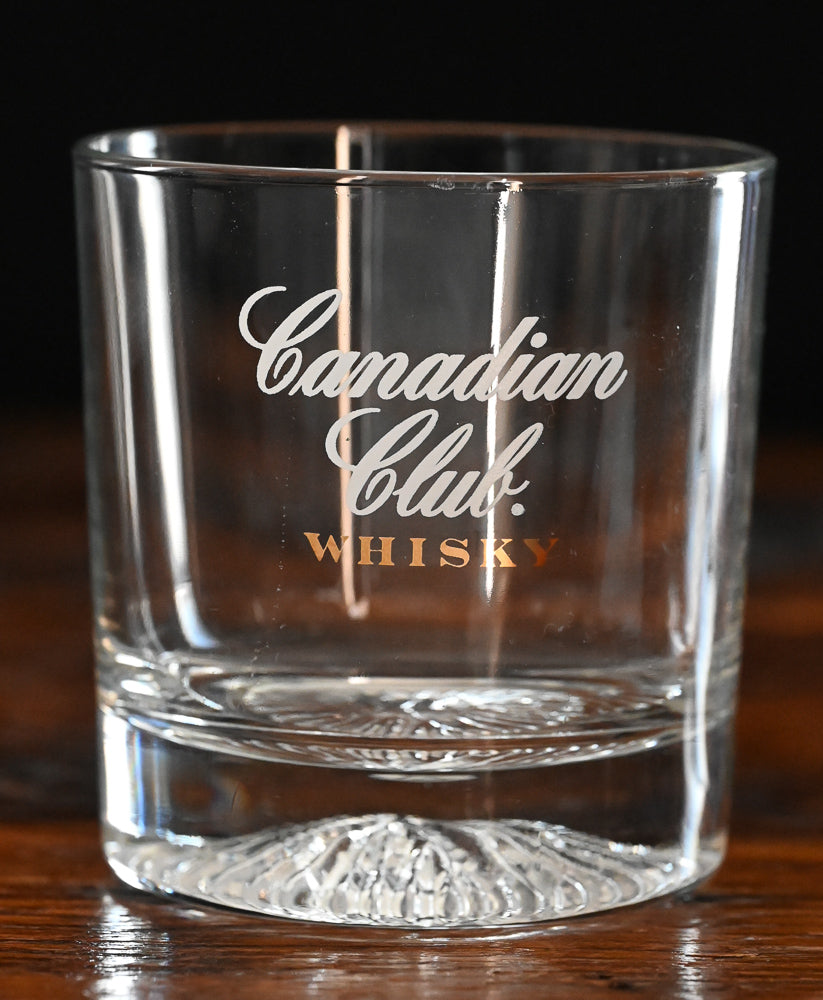 clear Canadian Club whisky rocks glass with glacier bottom