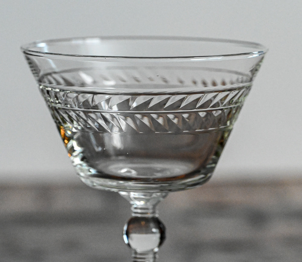clear glass etched Rock Sharpe cocktail coupes