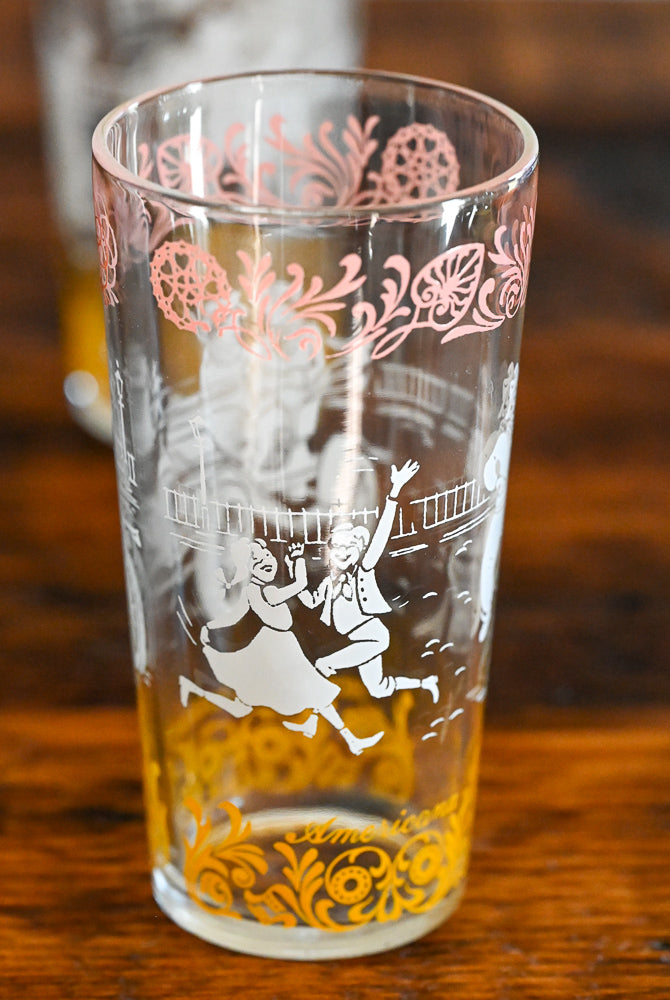 Highball glass with white, pink and yellow pattern