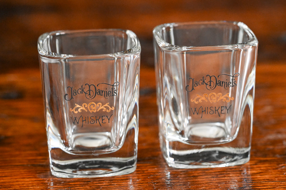 black and gold Jack Daniels shot glasses