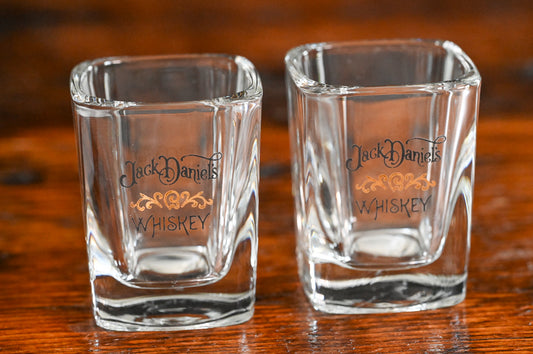 black and gold Jack Daniels shot glasses