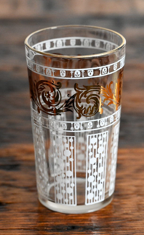 gold and white patterned tumblers