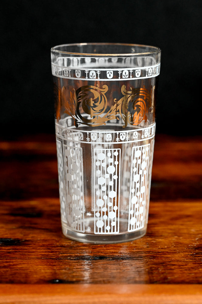 gold and white patterned tumblers