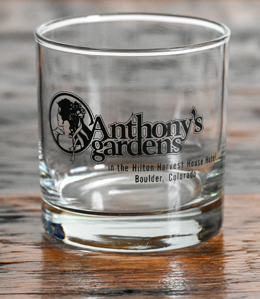rocks glass with Anthony's Gardens, Boulder Colorado logo